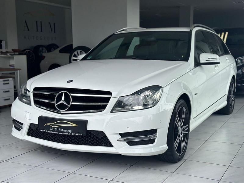 Polarweiss Gebraucht 2014 Mercedes C180 AMG line Kombi | 13.490 € (Fairer Preis) - Bild 1/4