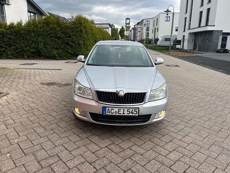 Second-hand Skoda Octavia Ambiente 105 CP (77 kW) 2010 Argintiu Break