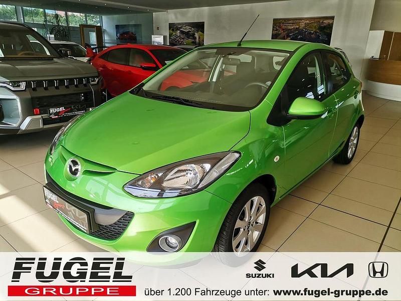 Metisgrün metallic Gebraucht 2013 Mazda 2 Edition Limousine | 7.495 € (Etwas zu teuer) - Bild 1/4