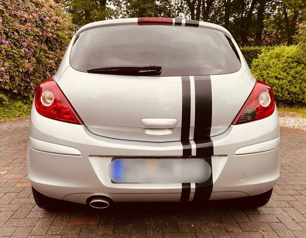 Gebraucht Opel Corsa 69 PS (50 kW) 2012 Silber Kleinwagen