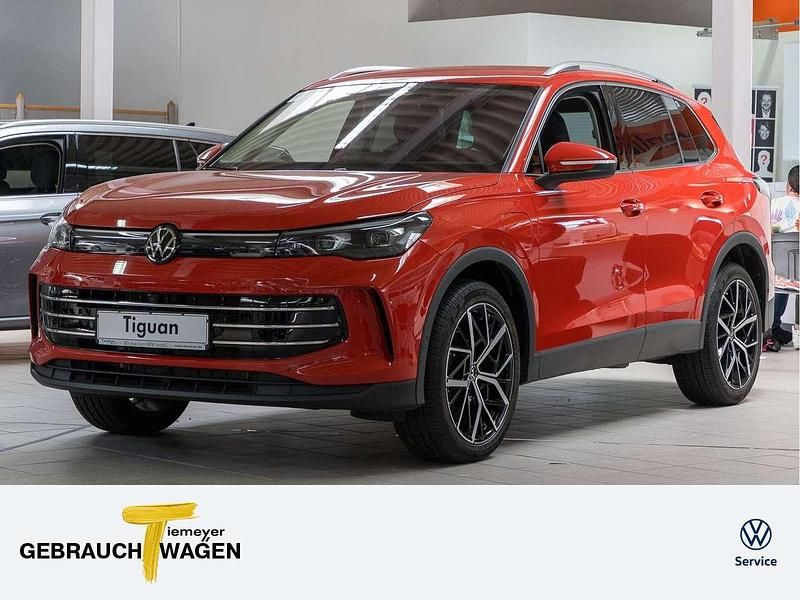 Persimmon red metallic Gebraucht 2024 VW Tiguan Elegance SUV | 44.260 € (Superpreis) - Bild 1/4