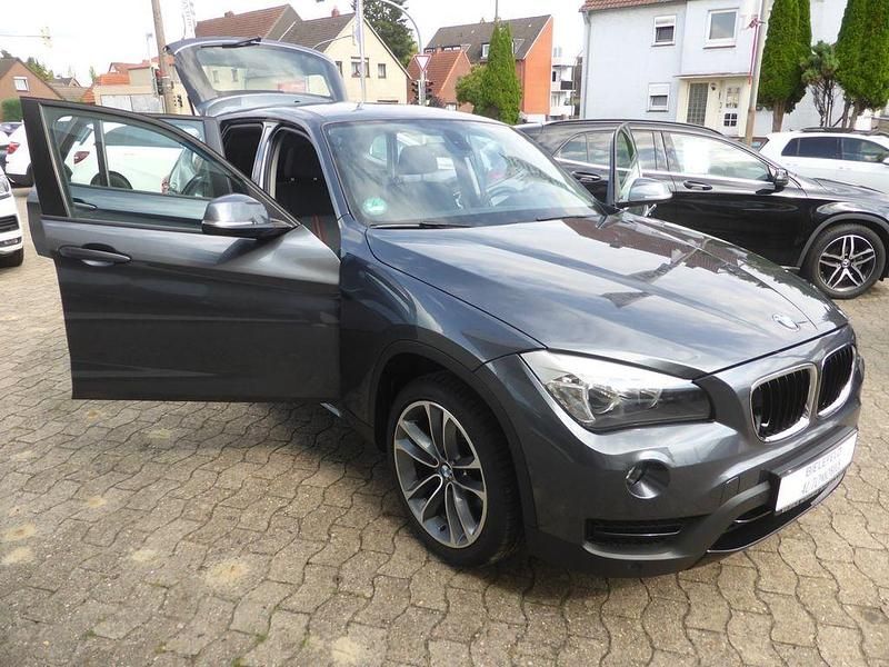 Grau Gebraucht 2013 BMW X1 Sport Line SUV | 15.900 € (Teuer) - Bild 1/4