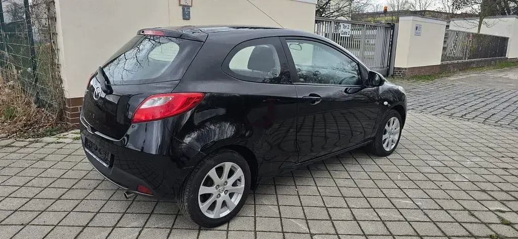 Używany Mazda 2 Edition 84 KM (61 kW) 2013 Czarny Hatchback