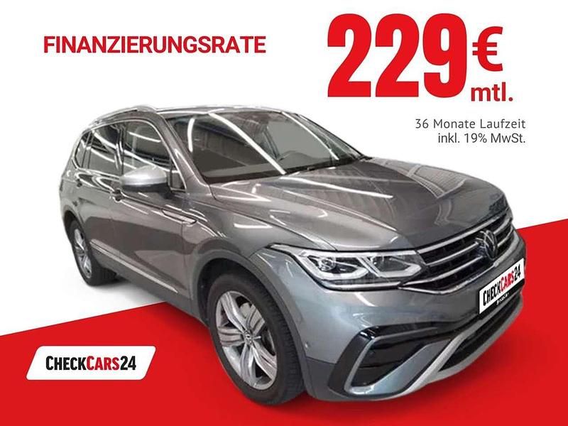 Grau Gebraucht 2024 VW Tiguan Allspace SUV | 44.289 € (Teuer) - Bild 1/4