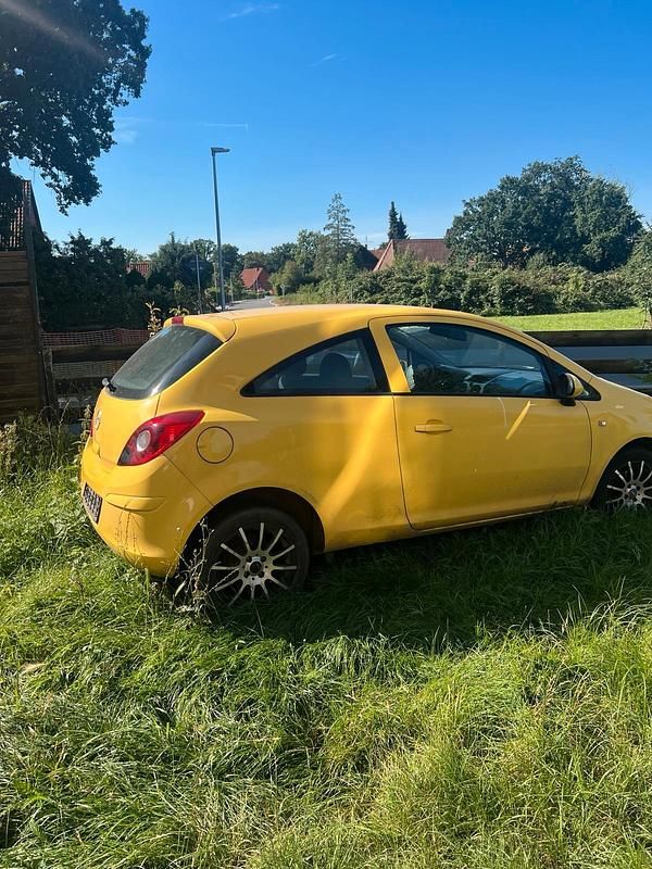 Gelb Gebraucht 2009 Opel Corsa Kleinwagen | 300 € - Bild 1/4