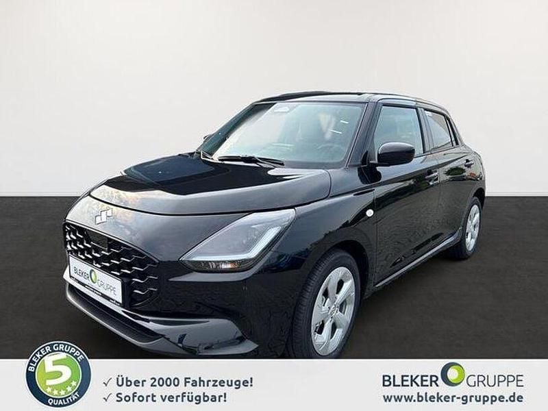 Super black pearl me Gebraucht 2024 Suzuki Swift Comfort Kleinwagen | 17.450 € (Fairer Preis) - Bild 1/4