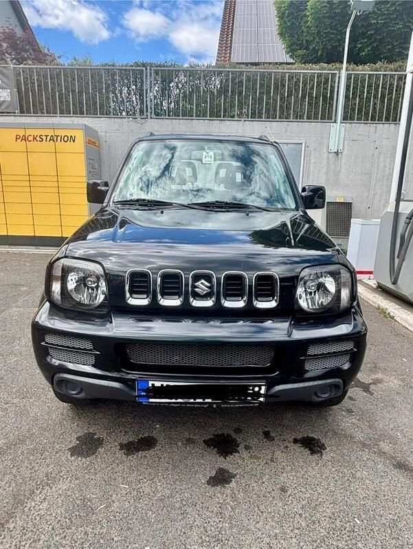 Schwarz Gebraucht 2009 Suzuki Jimny SUV | 9.500 € (Teuer) - Bild 1/4