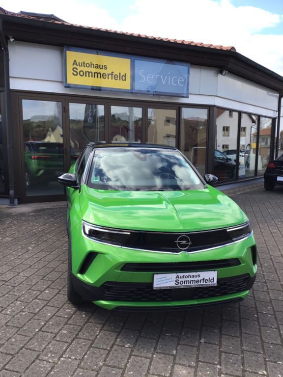 Grün lackierung matcha green/typ auss metallic Gebraucht 2024 Opel Mokka Enjoy SUV | 18.900 € (Guter Preis) - Bild 1/4