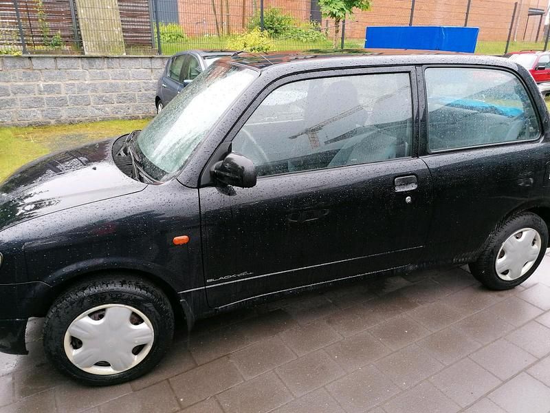 Gebraucht Daihatsu Cuore 56 PS (41 kW) 2002 Schwarz Kleinwagen