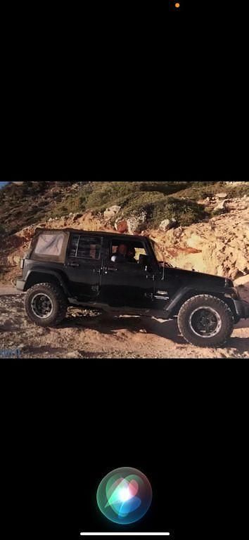 Schwarz Gebraucht 2009 Jeep Wrangler Unlimited Sahara SUV | 21.900 € (Guter Preis) - Bild 1/1