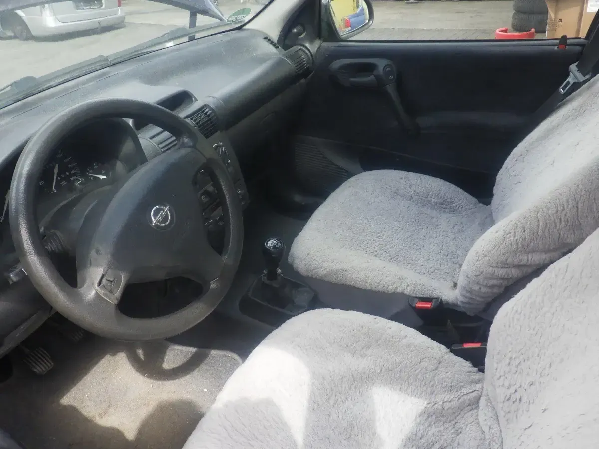 Second-hand Opel Corsa 58 CP (42 kW) 1999 Albastru Hatchback