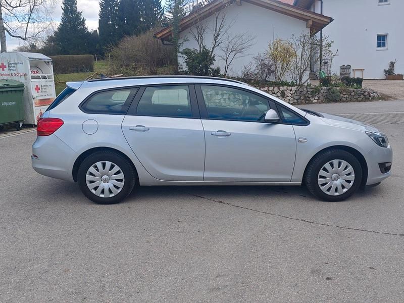 Second-hand Opel Astra 140 CP (102 kW) 2014 Argintiu Break
