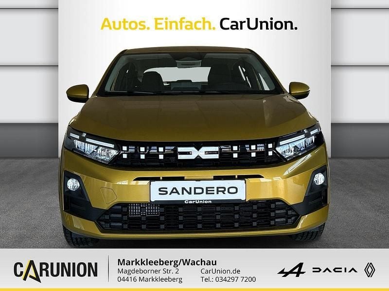 Neu Dacia Sandero Expression 101 PS (74 kW) 2026 Amber yellow Limousine