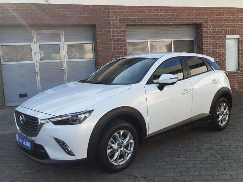Modsteinweiß metallic Gebraucht 2016 Mazda CX-3 Exclusive-Line SUV | 11.850 € (Fairer Preis) - Bild 1/4