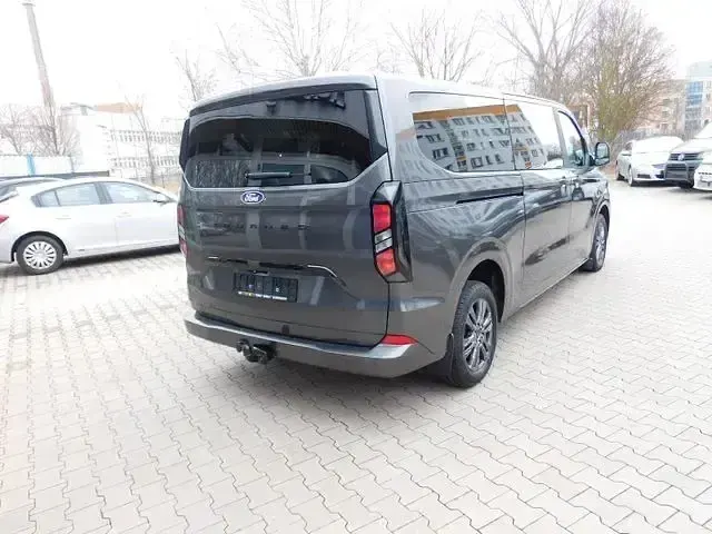 Gebraucht Ford Tourneo Custom Titanium 170 PS (125 kW) 2024 Grau Van