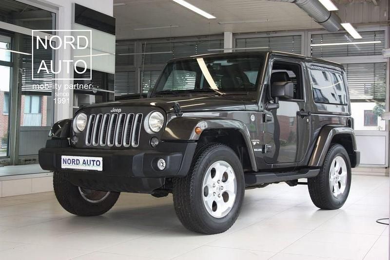 Grau Gebraucht 2018 Jeep Wrangler Sahara SUV | 32.790 € (Superpreis) - Bild 1/4