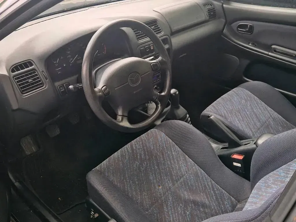 Gebraucht Mazda 323F 88 PS (64 kW) 1998 Blau Limousine