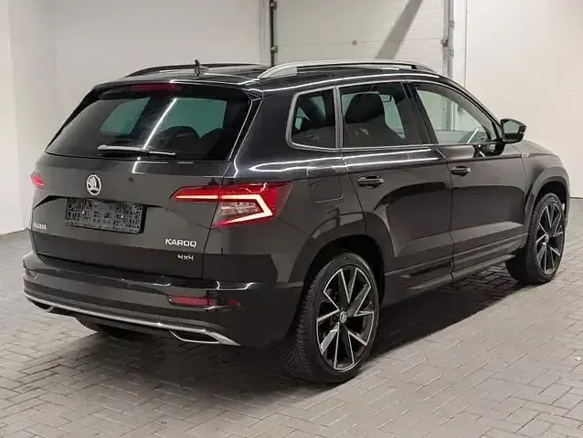 Gebraucht Skoda Karoq SportLine 190 PS (139 kW) 2019 Magicschwarzmet. SUV