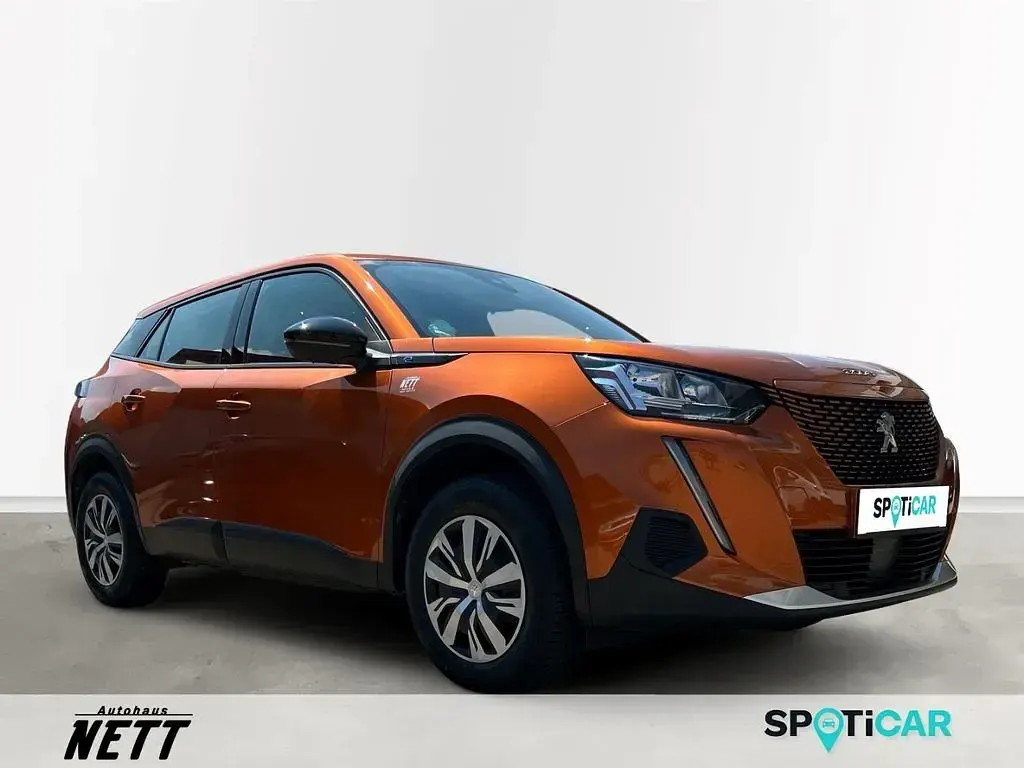 Gebraucht Peugeot e-2008 Active 100 kW (136 PS) 2022 Orange SUV