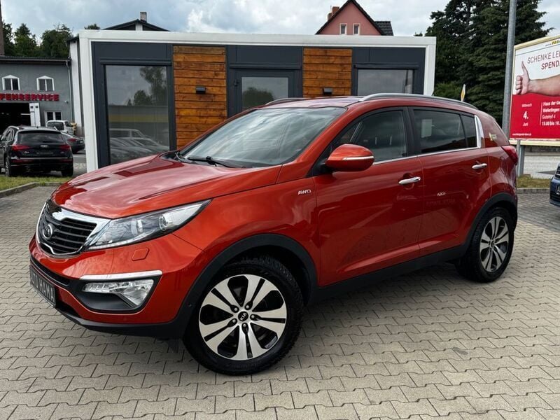 Orange Gebraucht 2013 Kia Sportage FIFA World Cup Edition SUV | 15.990 € (Teuer) - Bild 1/4