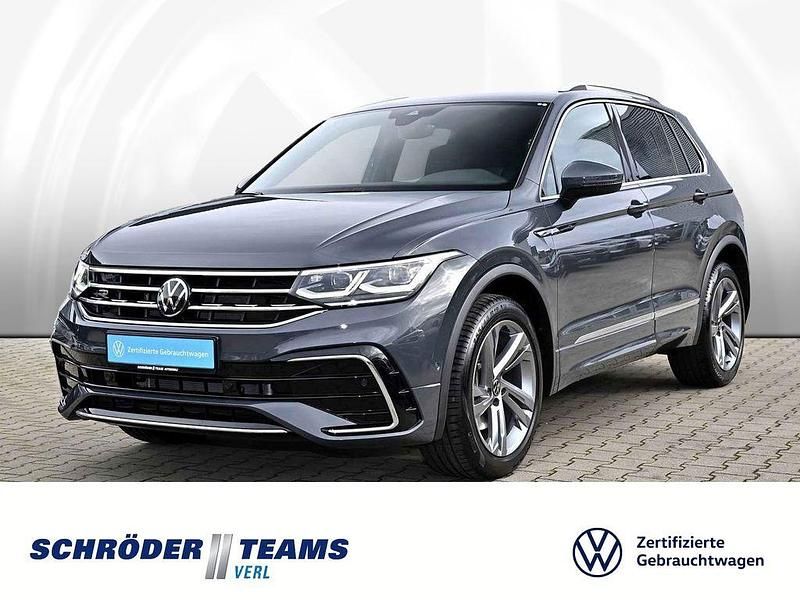 Delfingrau metallic Gebraucht 2023 VW Tiguan R-line SUV | 38.890 € (Fairer Preis) - Bild 1/4