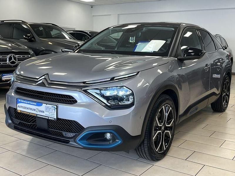 Grau Gebraucht 2023 Citroën e-C4 Shine Limousine | 19.400 € (Fairer Preis) - Bild 1/4