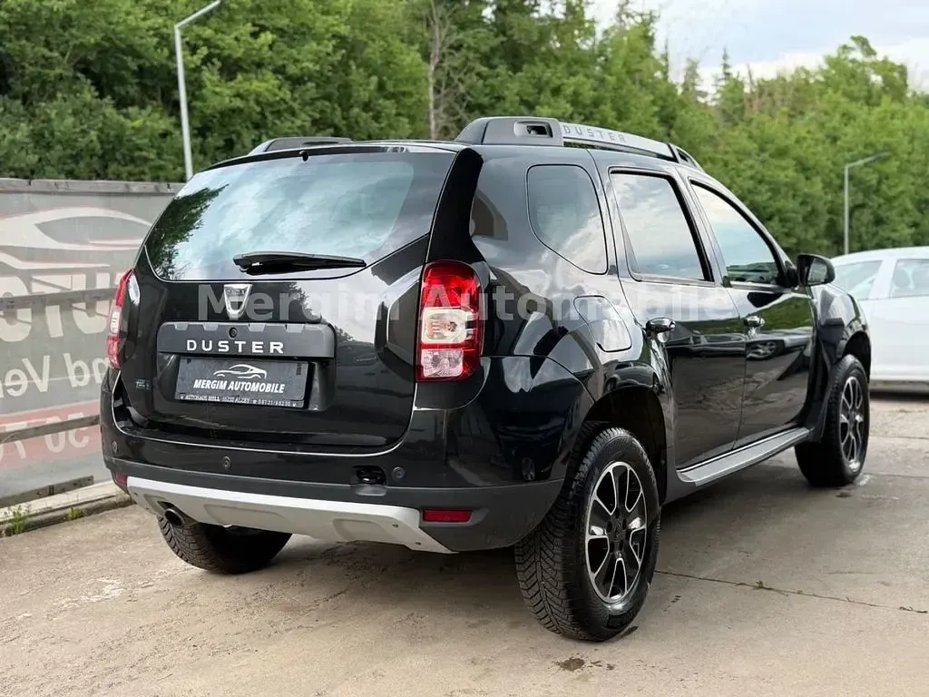 Używany Dacia Duster Prestige 125 KM (91 kW) 2016 Czarny SUV