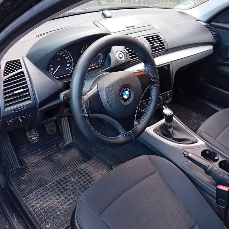 Używany BMW 116 122 KM (89 kW) 2008 Czarny Hatchback