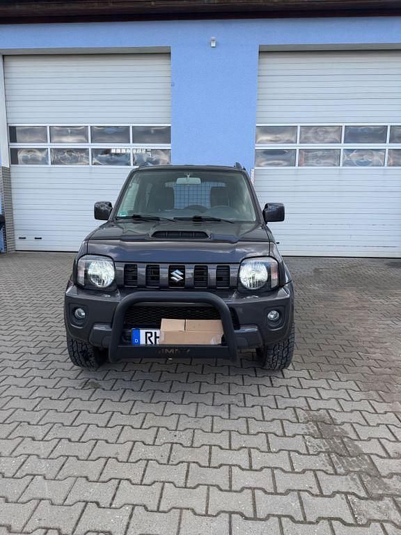 Second-hand Suzuki Jimny Style 86 CP (63 kW) 2012 Gri SUV