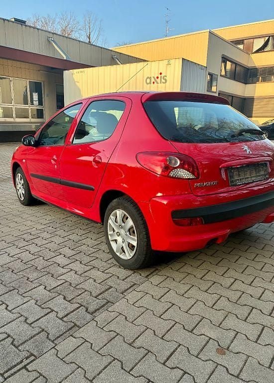 Gebraucht Peugeot 206+ 75 PS (55 kW) 2010 Rot Kleinwagen