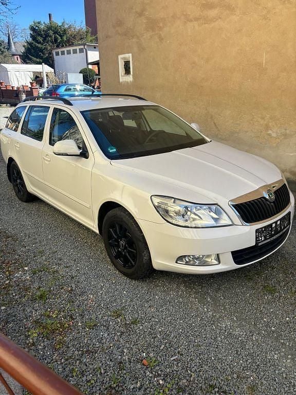 Second-hand Skoda Octavia Elegance 105 CP (77 kW) 2013 Alb Break