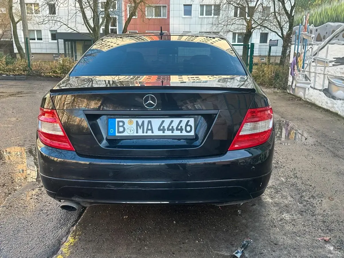 Second-hand Mercedes C200 AMG line 184 CP (135 kW) 2008 Negru Berlinǎ