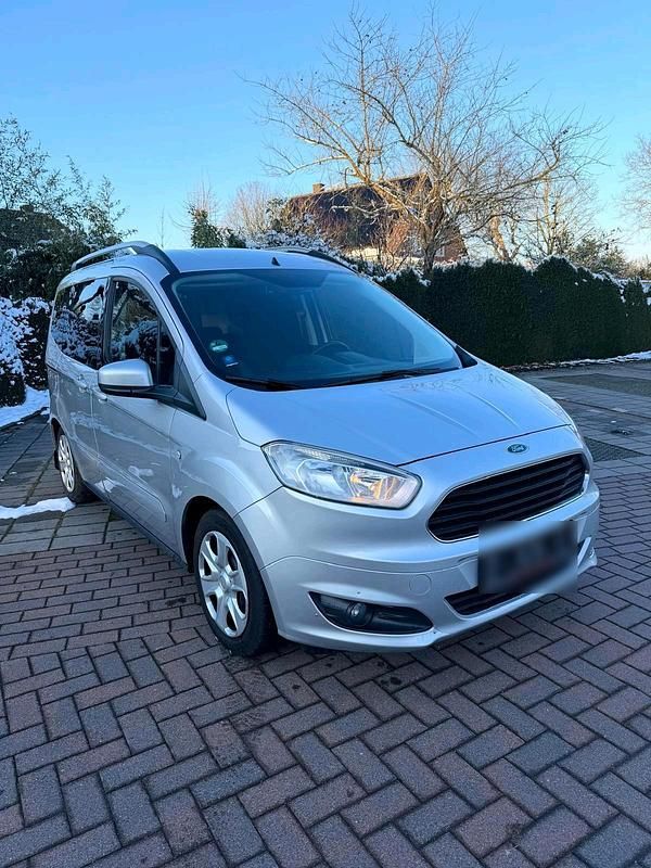 Gebraucht Ford Tourneo Courier 101 PS (74 kW) 2017 Silber Van / Kleinbus