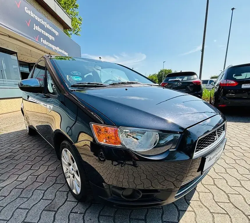 Gebraucht Mitsubishi Colt 95 PS (69 kW) 2011 Schwarz Kleinwagen