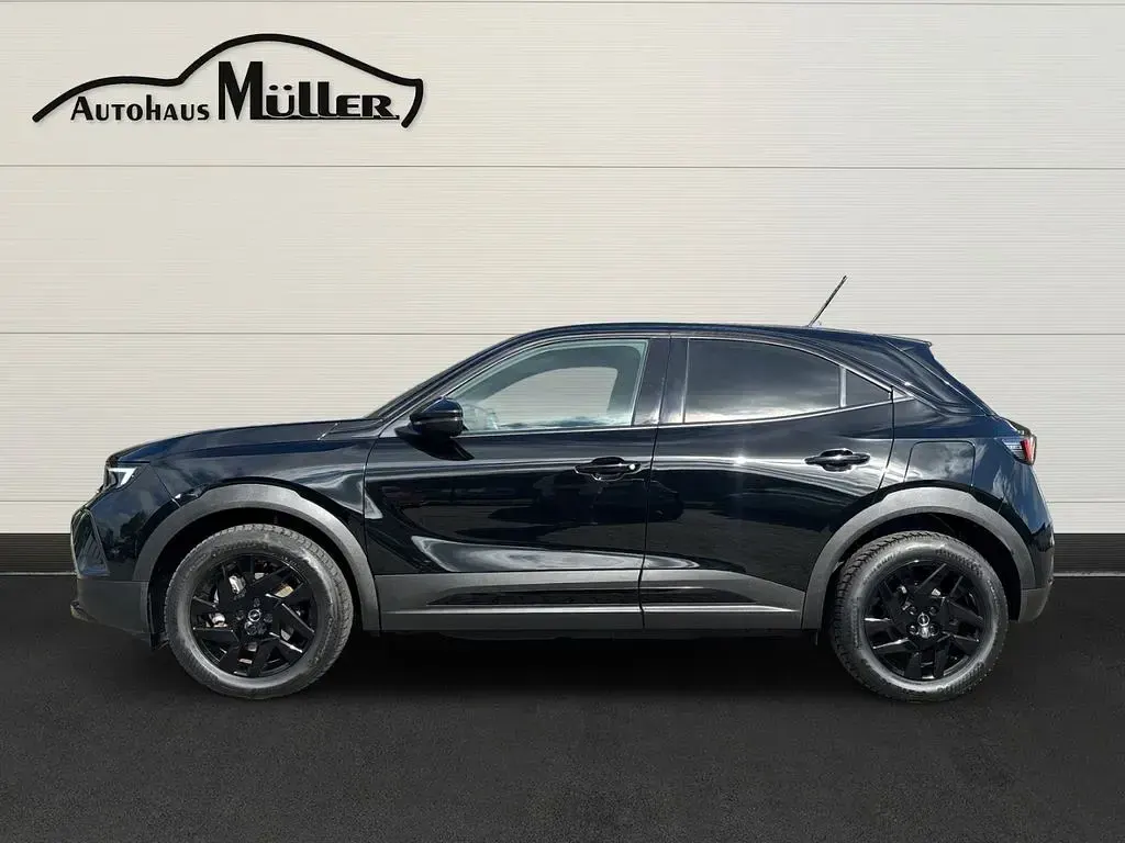 Gebraucht Opel Mokka-e GS Line 100 kW (136 PS) 2024 Lackierung schwarz perla nera/ SUV