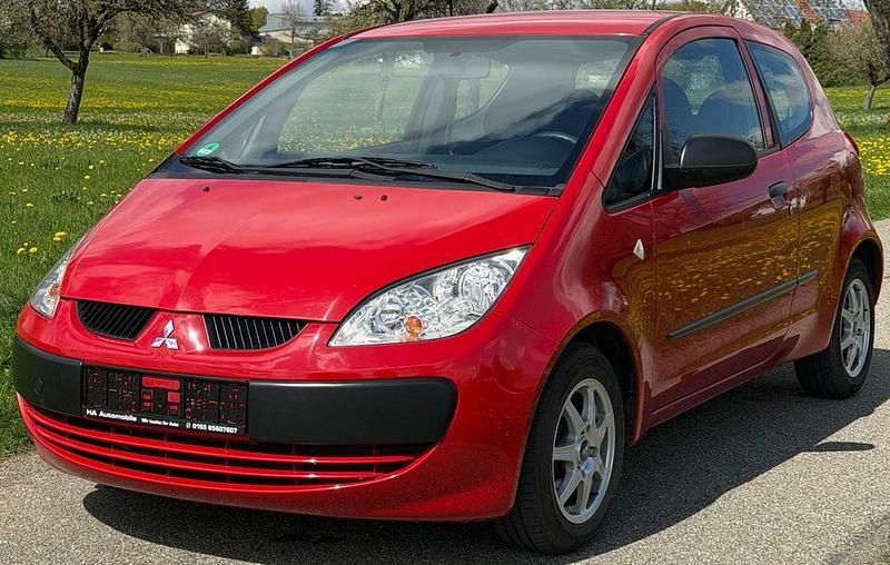 Second-hand Mitsubishi Colt Inform 75 CP (55 kW) 2008 Roșu Berlinǎ