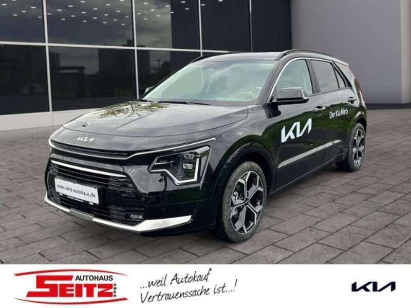 Auroraschwarz Gebraucht 2024 Kia Niro Spirit SUV | 33.880 € (Fairer Preis) - Bild 1/3