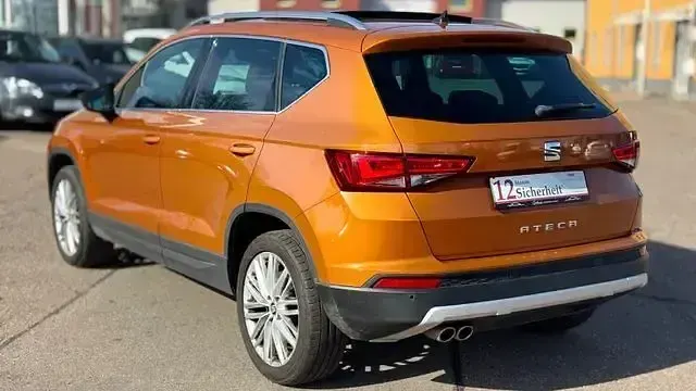 Używany Seat Ateca XCELLENCE 150 KM (110 kW) 2018 Pomarańczowy SUV