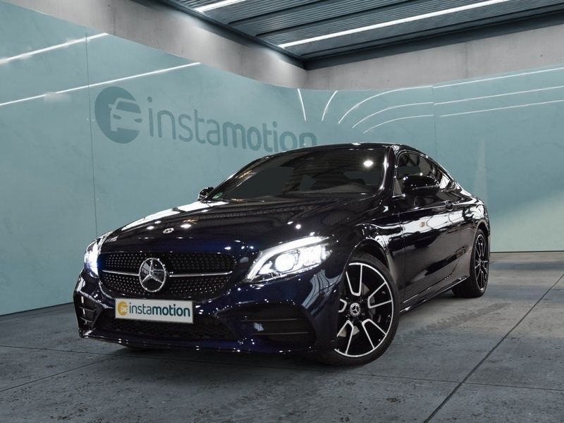 Blau Gebraucht 2022 Mercedes C180 AMG line Coupé | 48.300 € - Bild 1/4