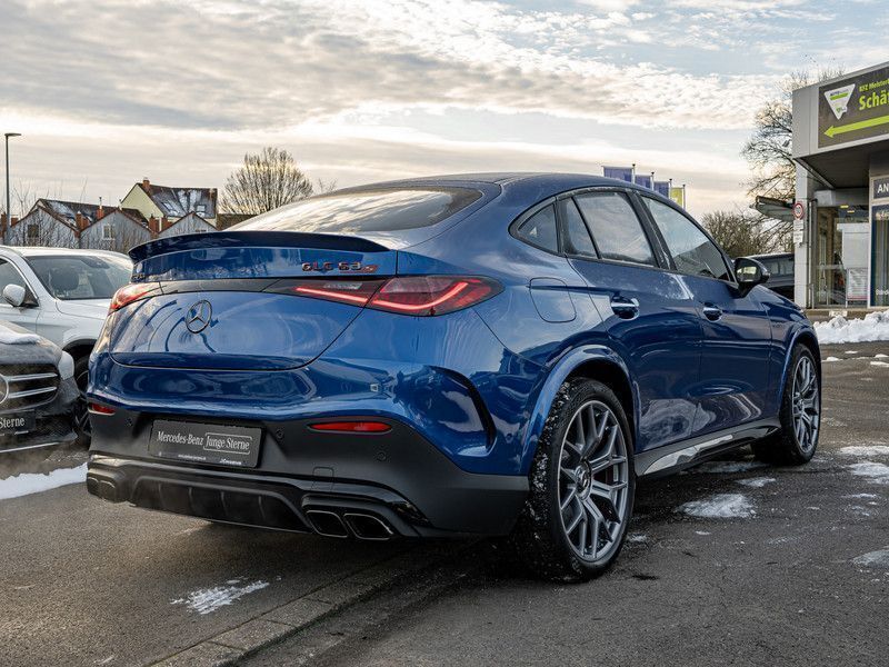 Gebraucht Mercedes GLC63 AMG AMG 476 PS (350 kW) 2024 Metalliclack spektralblau Coupé