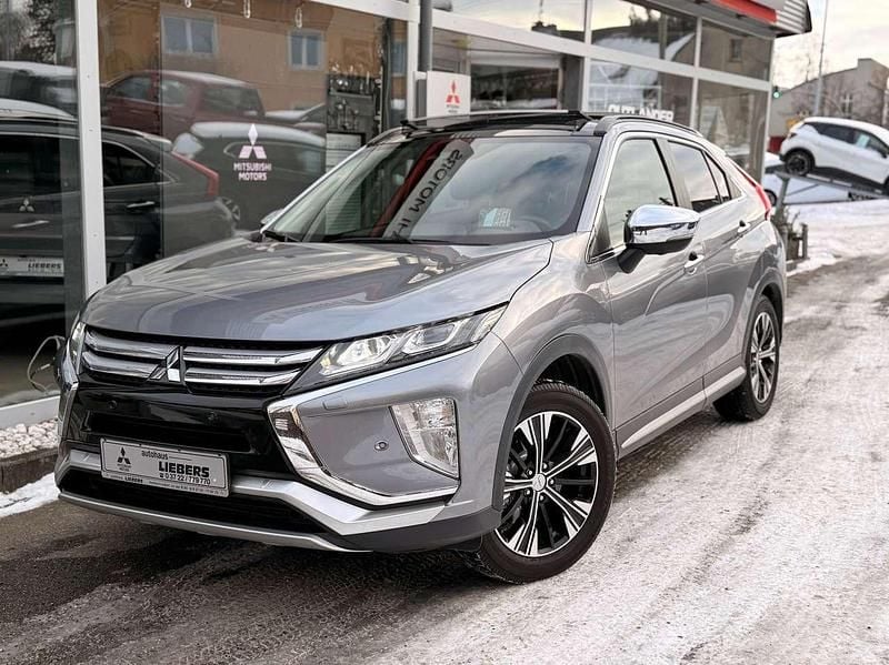 Platinumgrau (m) Gebraucht 2018 Mitsubishi Eclipse Cross Top SUV | 18.450 € (Etwas zu teuer) - Bild 1/4