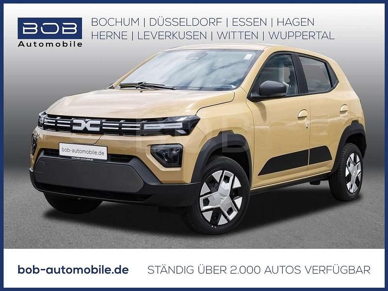 Safaribeige (beige) Neu 2025 Dacia Spring Expression Kleinwagen | 20.190 € (Teuer) - Bild 1/3