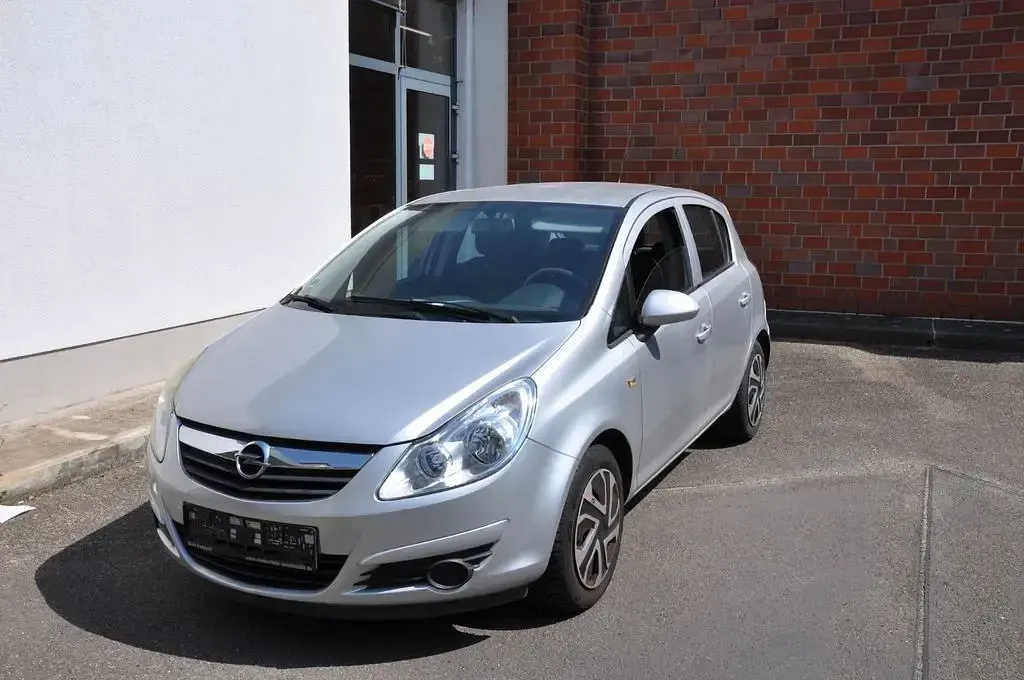 Używany Opel Corsa Basis 60 KM (44 kW) 2009 Srebrny Hatchback