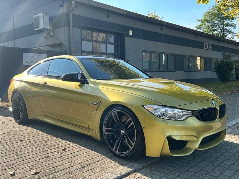 Gelb Gebraucht 2016 BMW M4 Performance Coupé | 35.900 € (Superpreis) - Bild 1/4