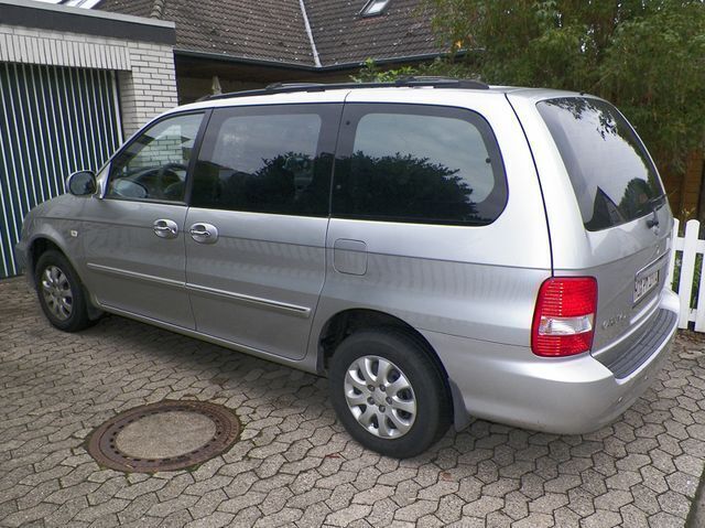 Gebraucht Kia Carnival 196 PS (144 kW) 2006 Grau metallic Van / Kleinbus