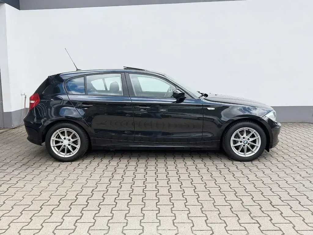 Usado BMW 116 116 CV (85 kW) 2009 Negro Utilitario