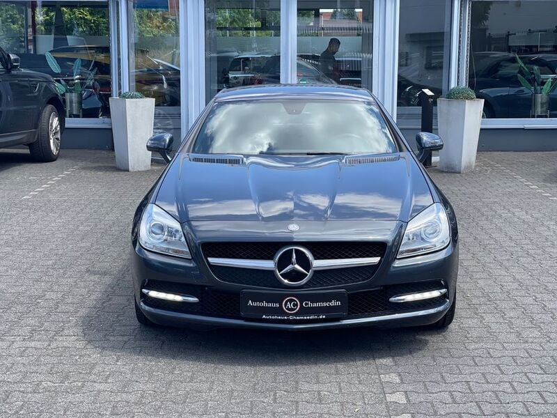 Tenoritgrau metalliclack Gebraucht 2012 Mercedes SLK200 Cabrio | 16.400 € (Fairer Preis) - Bild 1/4