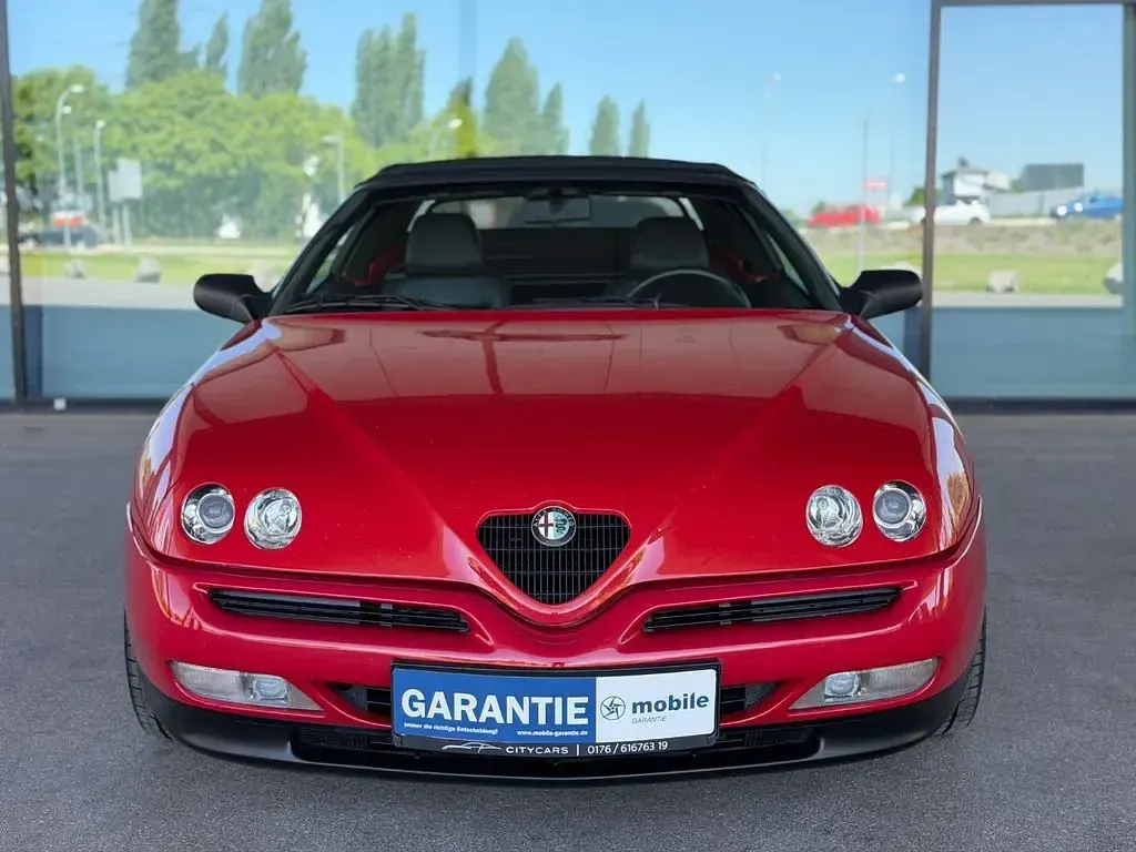 Second-hand Alfa Romeo Spider 165 CP (121 kW) 1998 Roșu Cabrio