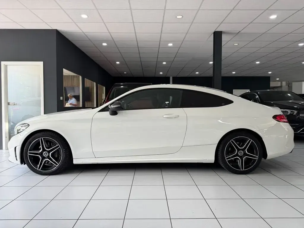Gebraucht Mercedes C200 Night 184 PS (135 kW) 2019 Polarweiss Coupé