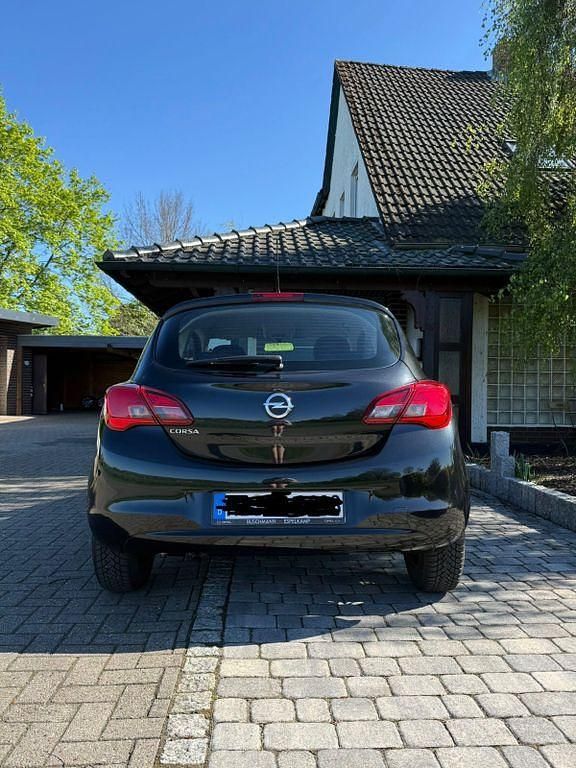 Używany Opel Corsa Selection 69 KM (50 kW) 2016 Czarny Hatchback